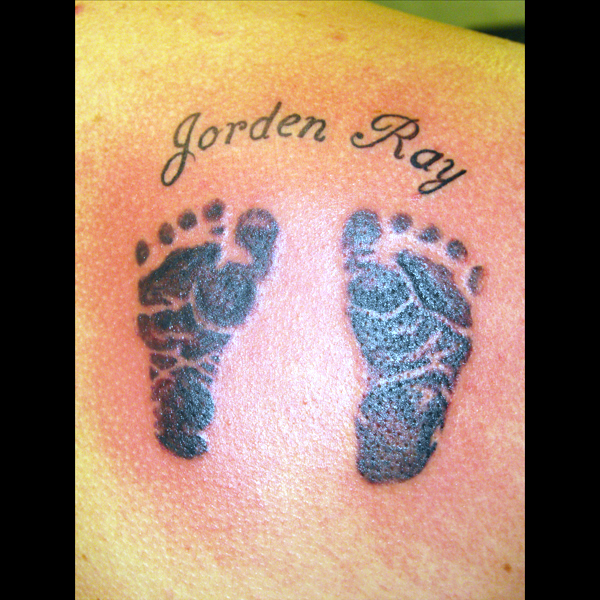 Baby foot print tattoo-Celebrating the Joy of Parenthood Tattoo ideas?